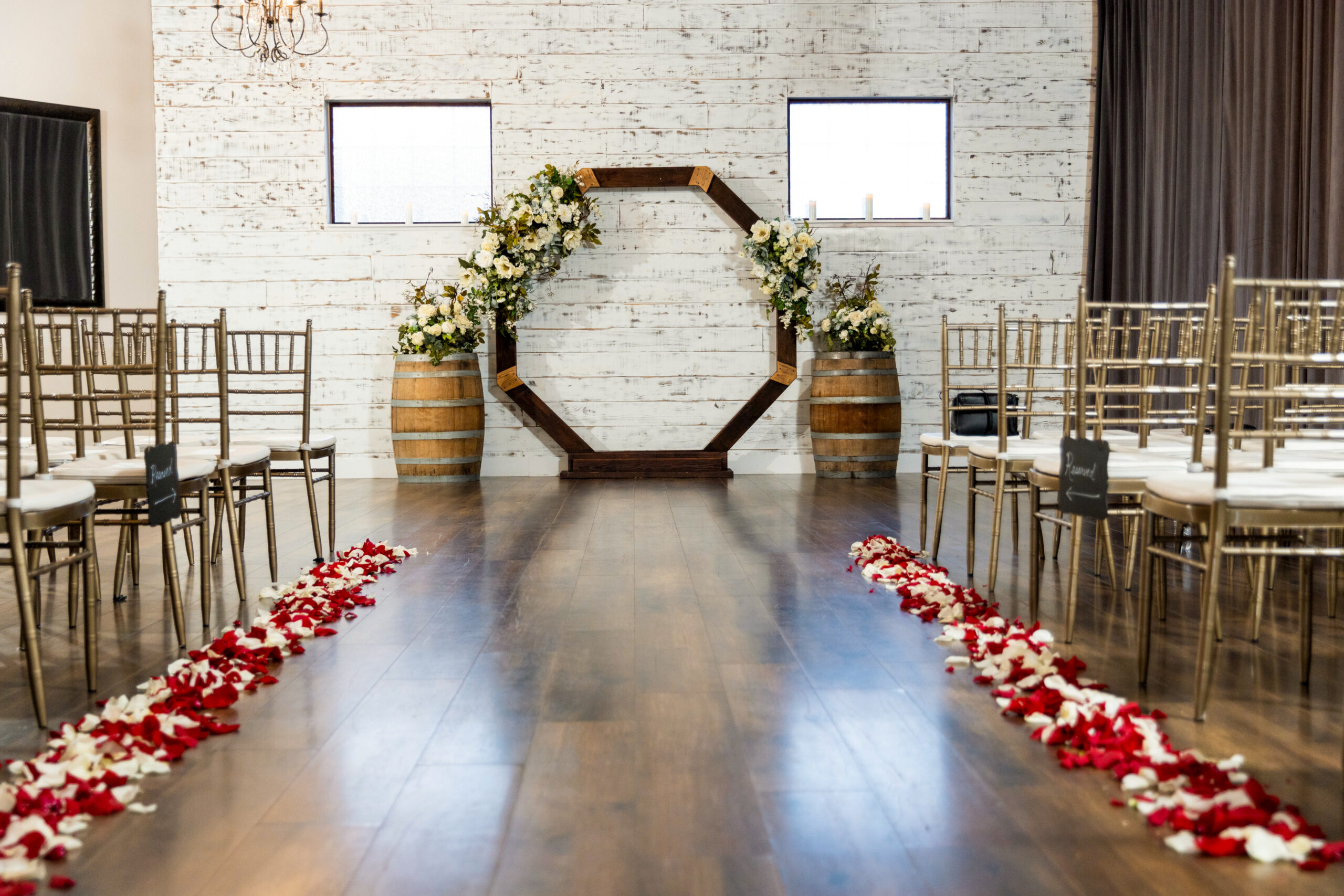 "Mara Villa's charming reception area with rustic touches, wooden accents, and beautiful floral arrangements."
